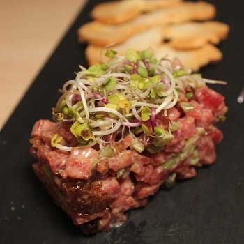 salchichon de malaga tartar dish