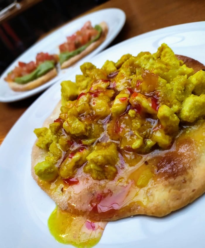 tortas inés rosales with curry chicken and guacamole