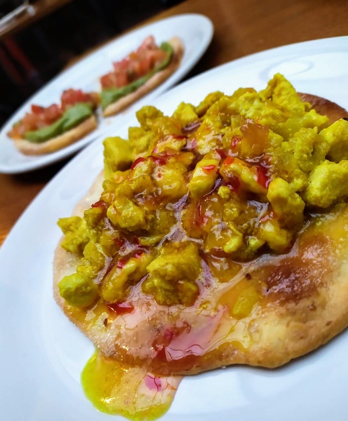 tortas inés rosales with curry chicken and guacamole